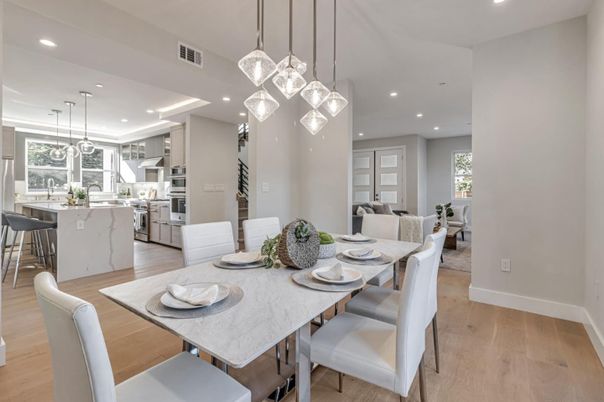 Dining room, Interior, Kitchen, Pendant Lights, Recessed Lighting, Stainless Steel Appliances, Wood Texture Flooring