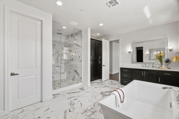 Bathroom, Dual Sink Vanities, Free Standing Baths, Glass Shower, Interior, Marble, Marble Walls, Recessed Lighting