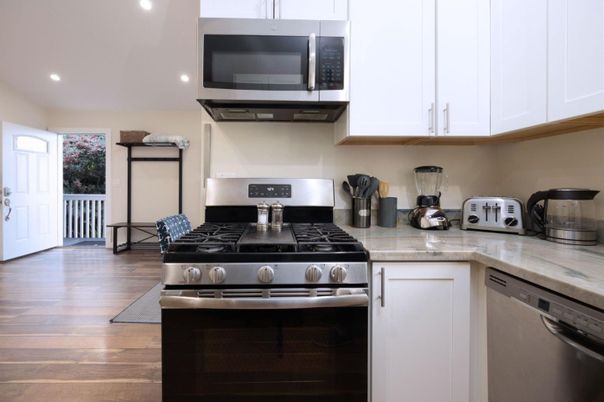 Interior, Kitchen, Recessed Lighting, Stainless Steel Appliances, Wood Texture Flooring