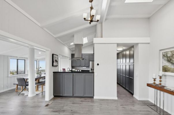 Chandelier, Dining room, Interior, Kitchen, Pendant Lights, Recessed Lighting, Stainless Steel Appliances, Wood Texture Flooring