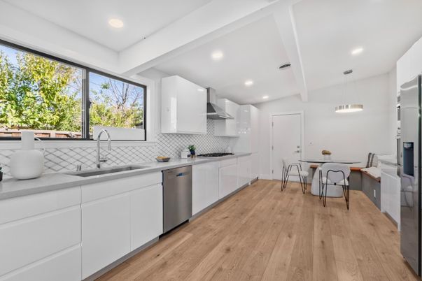 Dining room, Interior, Kitchen, Pendant Lights, Recessed Lighting, Stainless Steel Appliances, Wood Texture Flooring