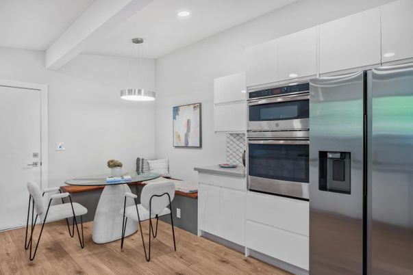 Dining room, Interior, Kitchen, Pendant Lights, Recessed Lighting, Stainless Steel Appliances, Wood Texture Flooring