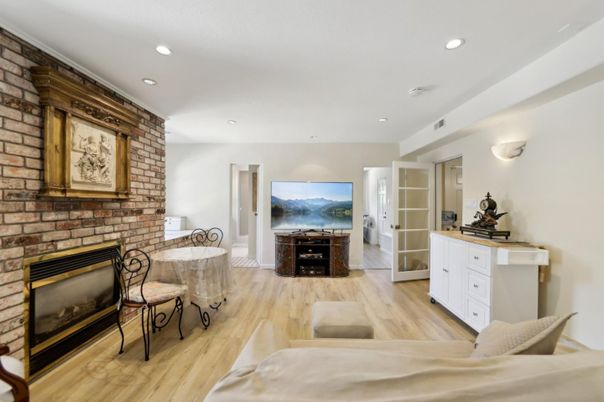 Fireplace, Interior, Recessed Lighting, Stone Walls, Wood Texture Flooring