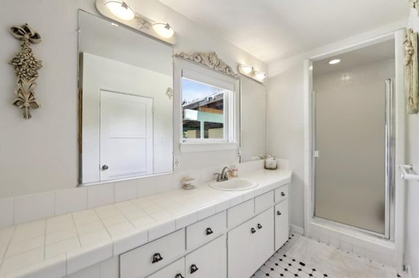 Bathroom, Dual Sink Vanities, Interior, Recessed Lighting, Tile Countertops