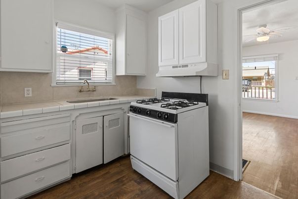 Interior, Kitchen, Tile Countertops, Wood Texture Flooring