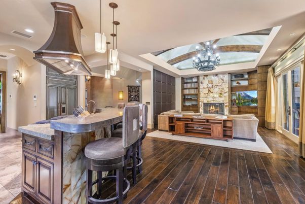 Chandelier, Fireplace, Interior, Living room, Pendant Lights, Recessed Lighting, Wooden Beams, Wood Texture Flooring