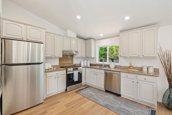 Interior, Kitchen, Recessed Lighting, Stainless Steel Appliances, Wood Texture Flooring