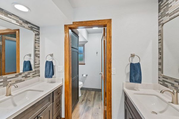 Bathroom, Dual Sink Vanities, Interior, Recessed Lighting, Wood Texture Flooring