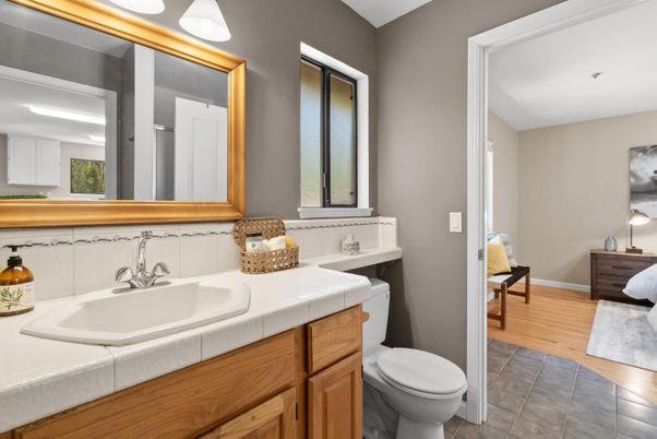 Bathroom, Dual Sink Vanities, Interior, Tile Countertops, Wood Texture Flooring