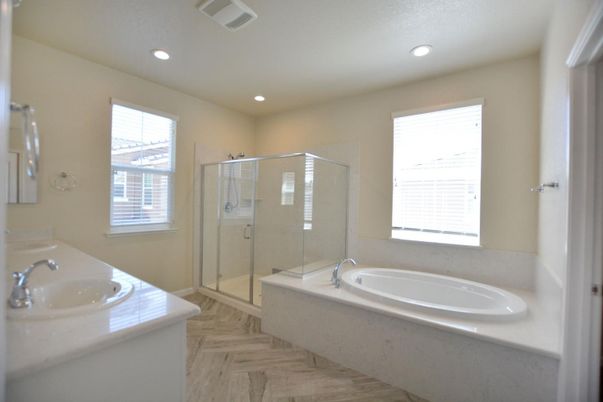Bathroom, Dual Sink Vanities, Glass Shower, Interior, Recessed Lighting, Wood Texture Flooring