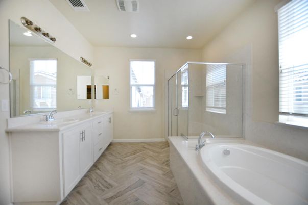 Bathroom, Dual Sink Vanities, Glass Shower, Interior, Recessed Lighting, Wood Texture Flooring