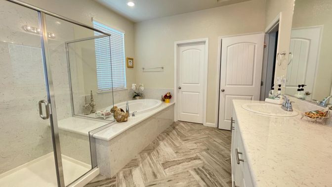 Bathroom, Dual Sink Vanities, Glass Shower, Interior, Recessed Lighting, Wood Texture Flooring