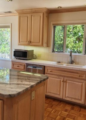 Interior, Kitchen, Recessed Lighting, Tile Countertops, Wood Texture Flooring