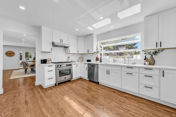 Dining room, Interior, Kitchen, Recessed Lighting, Stainless Steel Appliances, Wood Texture Flooring