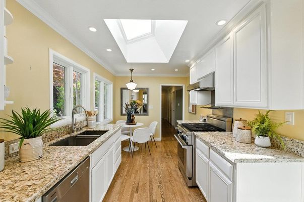 Dining room, Interior, Kitchen, Pendant Lights, Recessed Lighting, Stainless Steel Appliances, Wood Texture Flooring