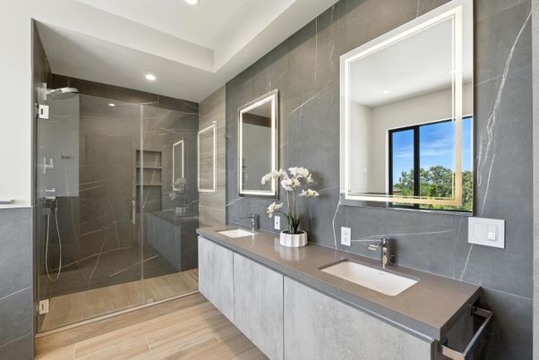 Bathroom, Dual Sink Vanities, Glass Shower, Interior, Recessed Lighting, Wood Texture Flooring