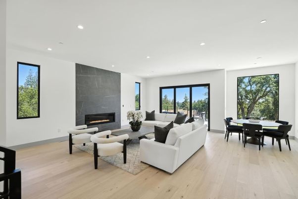 Dining room, Fireplace, Interior, Living room, Recessed Lighting, Wood Texture Flooring