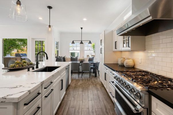 Dining room, Interior, Kitchen, Pendant Lights, Recessed Lighting, Stainless Steel Appliances, Wood Texture Flooring