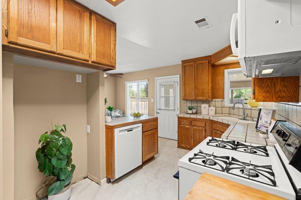 Interior, Kitchen, Recessed Lighting, Tile Countertops