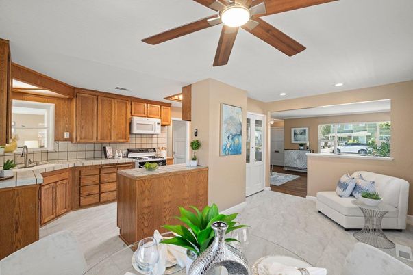 Interior, Kitchen, Recessed Lighting, Tile Countertops, Wood Texture Flooring