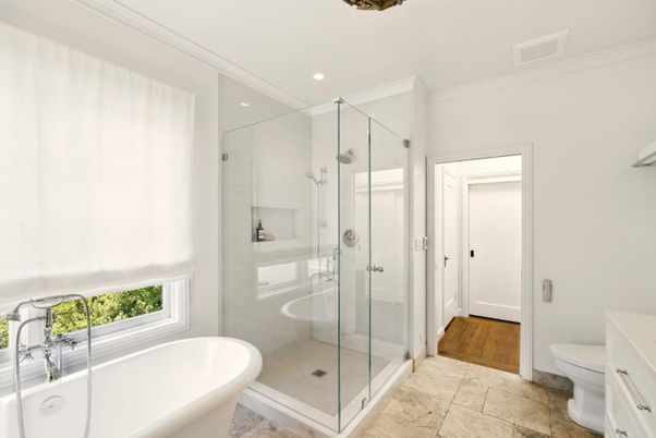 Bathroom, Free Standing Baths, Glass Shower, Interior, Recessed Lighting, Wood Texture Flooring
