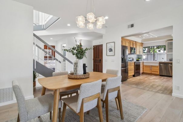 Dining room, Interior, Kitchen, Pendant Lights, Recessed Lighting, Stainless Steel Appliances, Wood Texture Flooring