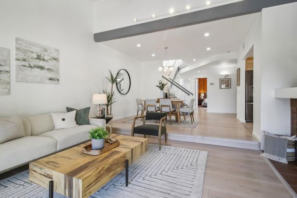 Chandelier, Dining room, Fireplace, Interior, Living room, Pendant Lights, Recessed Lighting, Wood Texture Flooring