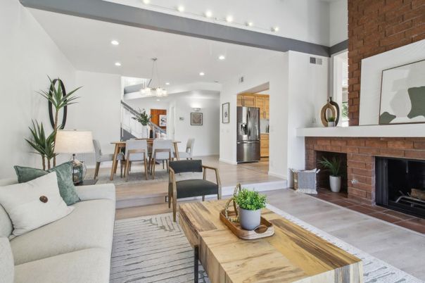 Dining room, Fireplace, Interior, Kitchen, Living room, Pendant Lights, Recessed Lighting, Stainless Steel Appliances, Stone Walls, Wood Texture Flooring