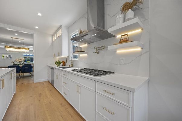 Dining room, Interior, Kitchen, Marble Walls, Pendant Lights, Recessed Lighting, Stainless Steel Appliances, Wood Texture Flooring