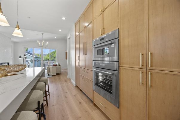 Chandelier, Interior, Kitchen, Pendant Lights, Recessed Lighting, Stainless Steel Appliances, Wood Texture Flooring