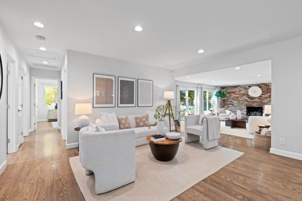 Fireplace, Interior, Living room, Recessed Lighting, Stone Walls, Wood Texture Flooring