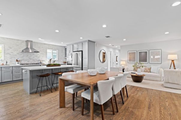 Dining room, Interior, Kitchen, Living room, Recessed Lighting, Stainless Steel Appliances, Wood Texture Flooring