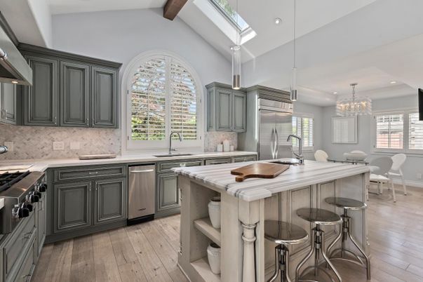 Chandelier, Dining room, Interior, Kitchen, Pendant Lights, Recessed Lighting, Stainless Steel Appliances, Wooden Beams, Wood Texture Flooring