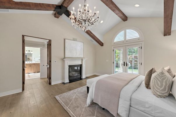 Bedroom, Chandelier, Fireplace, Interior, Recessed Lighting, Wooden Beams, Wood Texture Flooring