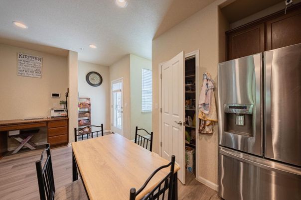 Dining room, Interior, Kitchen, Recessed Lighting, Stainless Steel Appliances, Wood Texture Flooring