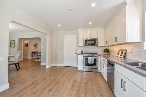 Interior, Kitchen, Recessed Lighting, Stainless Steel Appliances, Wood Texture Flooring