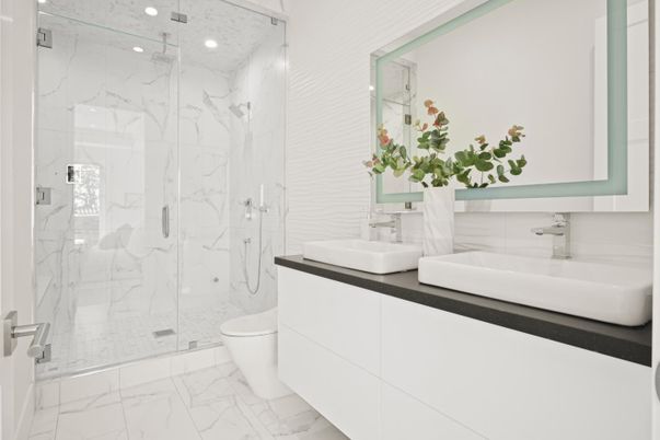 Bathroom, Dual Sink Vanities, Glass Shower, Interior, Marble, Marble Walls, Recessed Lighting