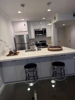 Interior, Kitchen, Pendant Lights, Recessed Lighting, Stainless Steel Appliances, Wood Texture Flooring