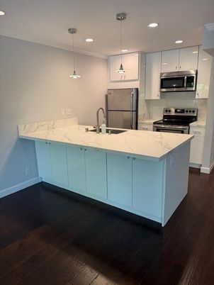 Interior, Kitchen, Pendant Lights, Recessed Lighting, Stainless Steel Appliances, Wood Texture Flooring