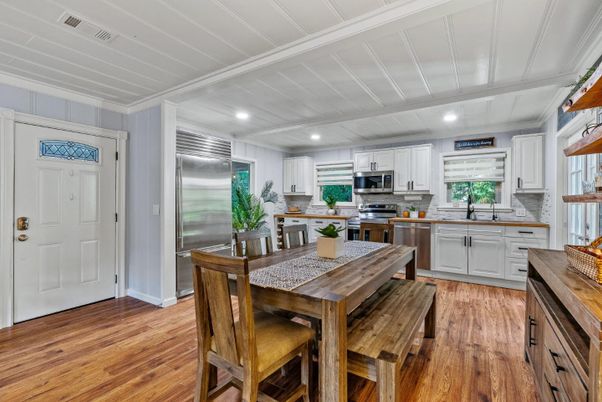 Dining room, Interior, Kitchen, Recessed Lighting, Stainless Steel Appliances, Wood Texture Flooring