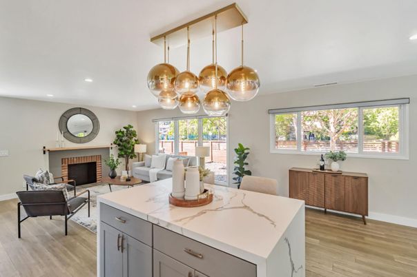 Dining room, Fireplace, Interior, Living room, Recessed Lighting, Wood Texture Flooring