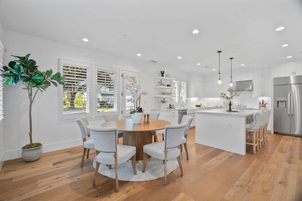Dining room, Interior, Kitchen, Pendant Lights, Recessed Lighting, Stainless Steel Appliances, Wood Texture Flooring