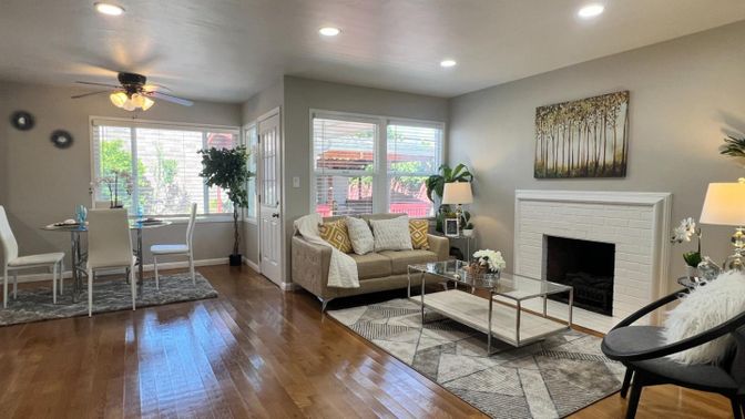Dining room, Fireplace, Interior, Living room, Recessed Lighting, Wood Texture Flooring