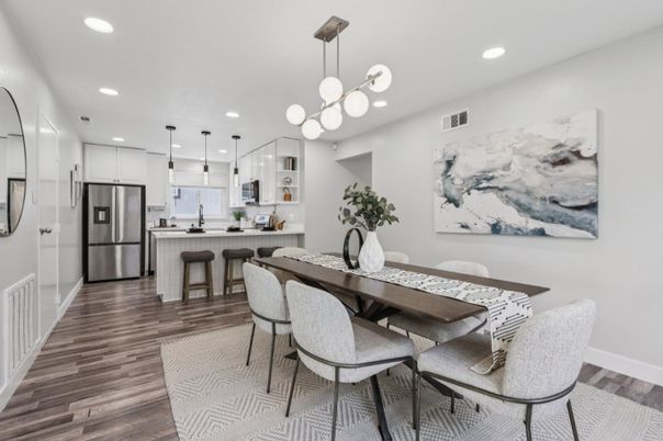 Dining room, Interior, Kitchen, Pendant Lights, Recessed Lighting, Stainless Steel Appliances, Wood Texture Flooring