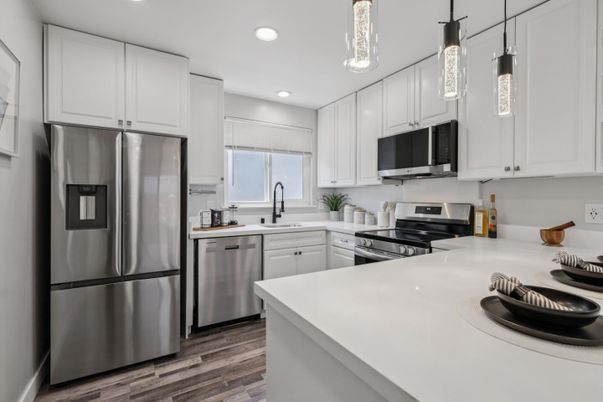 Interior, Kitchen, Pendant Lights, Recessed Lighting, Stainless Steel Appliances, Wood Texture Flooring