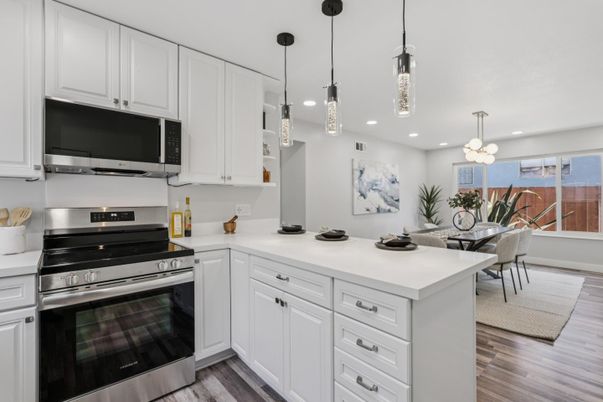 Dining room, Interior, Kitchen, Pendant Lights, Recessed Lighting, Stainless Steel Appliances, Wood Texture Flooring