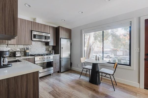 Dining room, Interior, Kitchen, Recessed Lighting, Stainless Steel Appliances, Wood Texture Flooring