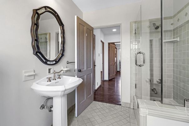 Bathroom, Dual Sink Vanities, Glass Shower, Interior, Recessed Lighting, Wood Texture Flooring