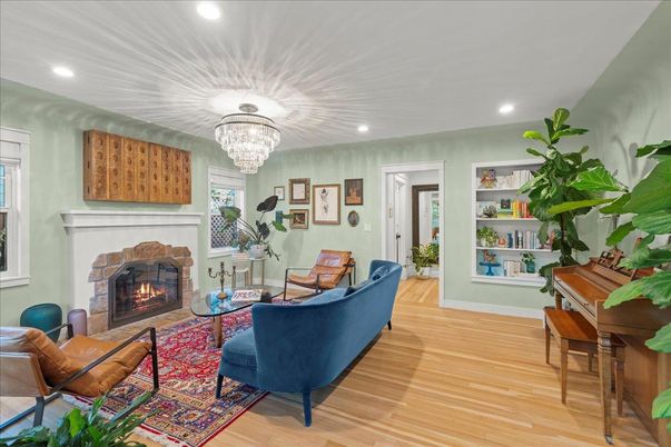Chandelier, Fireplace, Interior, Living room, Piano, Recessed Lighting, Wood Texture Flooring