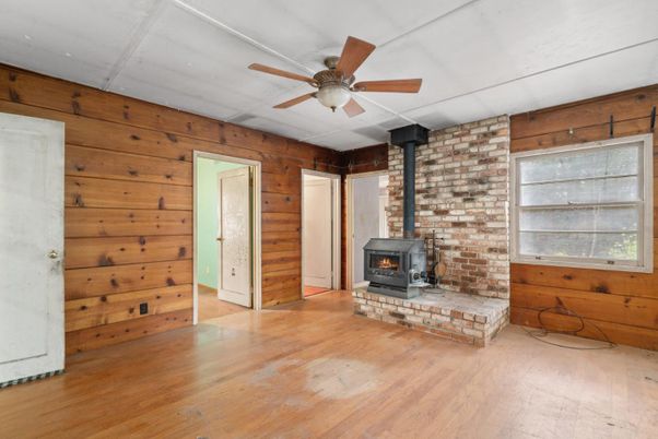 Empty room, Fireplace, Interior, Stone Walls, Wood Texture Flooring, Wooden Walls